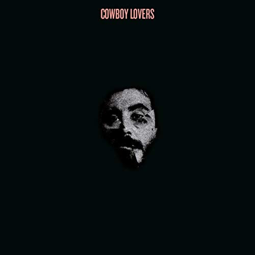 Black album cover with a distressed, close-up portrait of a man.