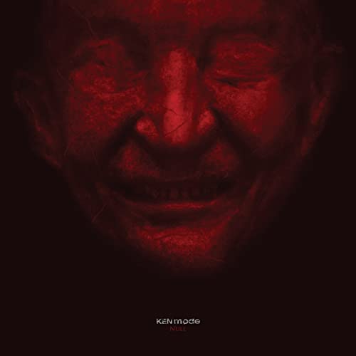 Red textured close-up of a face with closed eyes, album cover art.