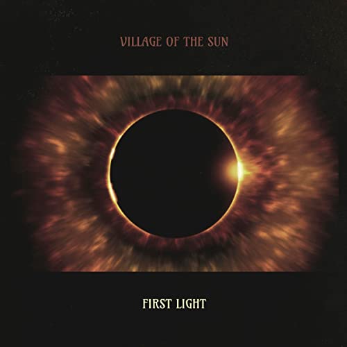 CD cover with a dark eclipse image and text “Village Of The Sun”.