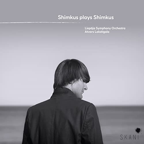 CD cover: man seen from behind, grey sky and sea background.