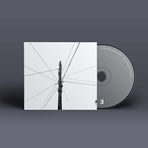 CD case with a black-and-white image of a utility pole and wires, with a CD.
