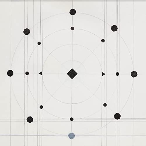 Vinyl record cover with geometric design of circles and black shapes.