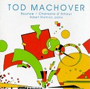 Album cover with abstract shapes in red, green, and yellow on a white background.