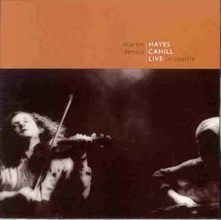 The alt text for the image is: "CD cover featuring a black-and-white photo of two musicians performing."