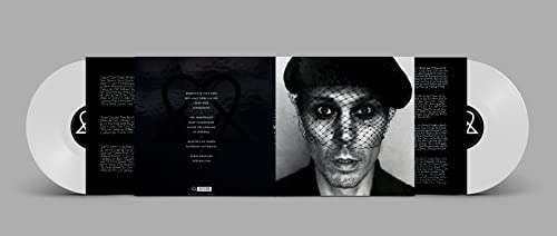 Open vinyl record with black and white portrait of a person in a net.