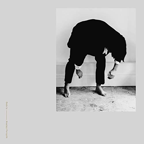 Black and white album cover featuring a person bending over.