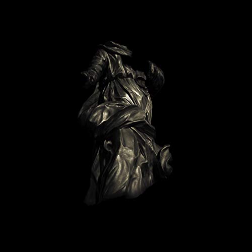 Dark, abstract sculpture of draped fabric against a black background.