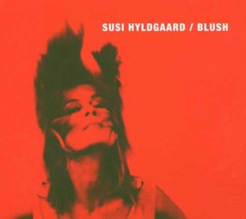 Red album cover with a woman's portrait and white text "SUSI HYLDGAARD / BLUSH".
