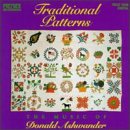 CD cover featuring colorful, patterned quilt designs and floral motifs.