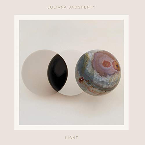 Album cover for Juliana Daugherty’s “Light” featuring painted spheres.