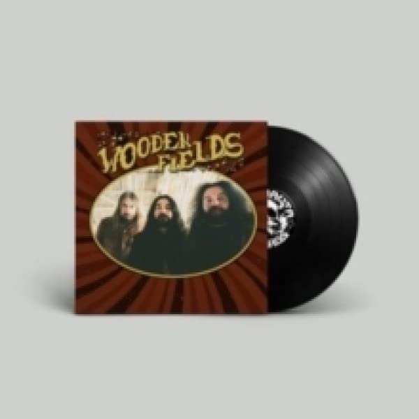 Vinyl record album cover featuring three bearded men with a black vinyl disc.