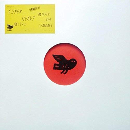 White vinyl record cover with yellow sticker and red circle design.