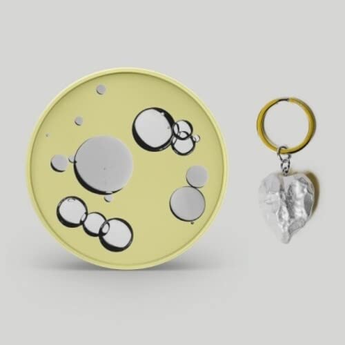 CD case with bubble design and a silver heart-shaped keyring.