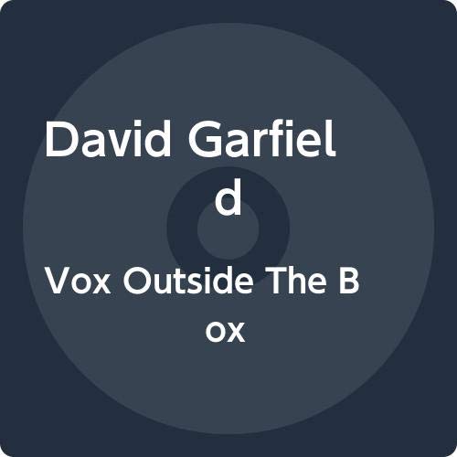 "Album cover featuring a microphone in a desert landscape with 'VOX OUTSIDE THE BOX' text."