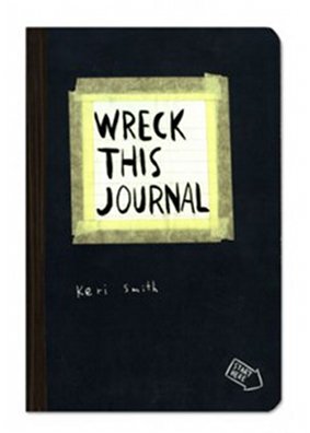 "Wreck This Journal" book cover with dark background, white title, and author's name.