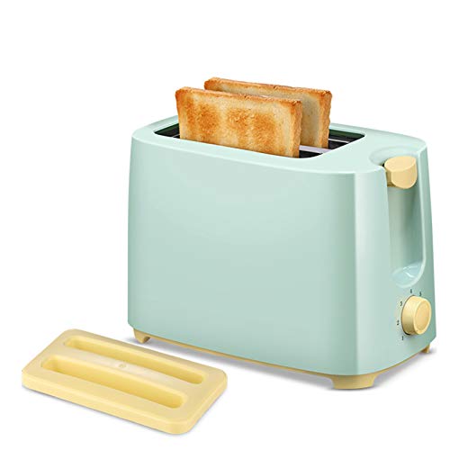 Pale green two-slice toaster with golden-brown toast and a crumb tray.
