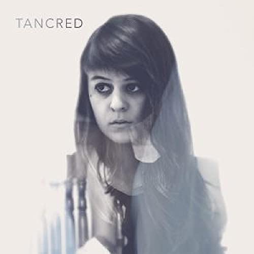 Album cover featuring a portrait of a woman with dark hair.