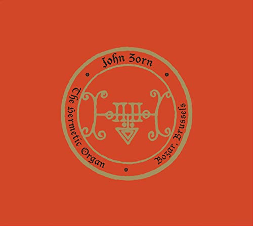 Red album cover with ornate gold symbol and text: John Zorn.