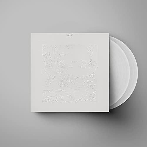 Bon Iver album cover with embossed landscape and vinyl record beside it.