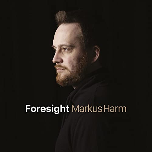 Portrait of Markus Harm with album title "Foresight" in white text.