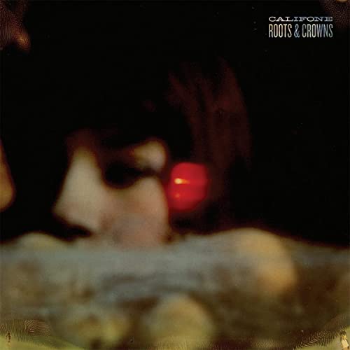 Califone "Roots & Crowns" vinyl album cover with blurred portrait.