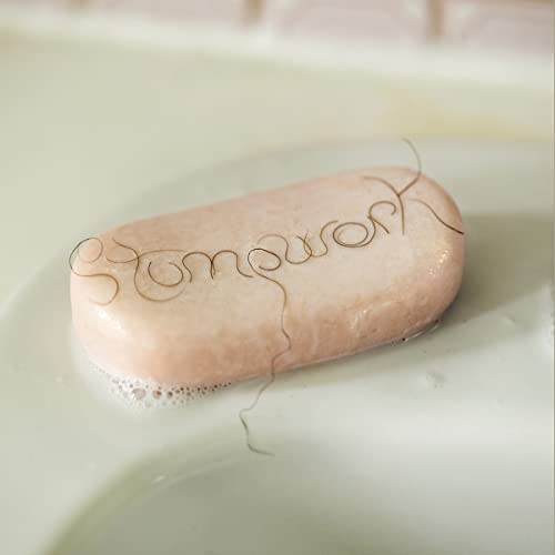 Pink soap bar with the word "Stumpwork" etched in brown hair.