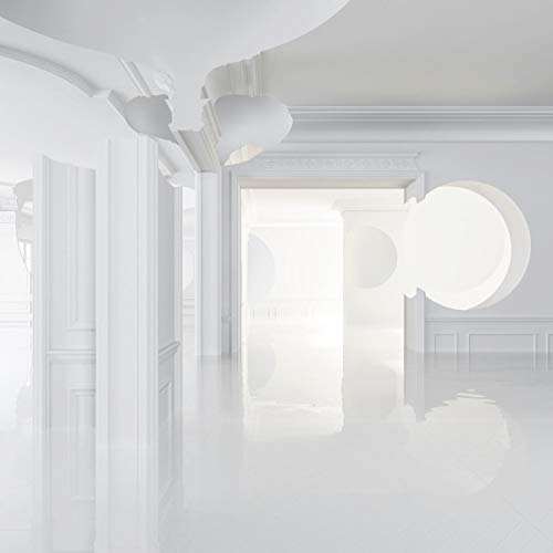 All-white, minimalist architectural hallway with circular openings.