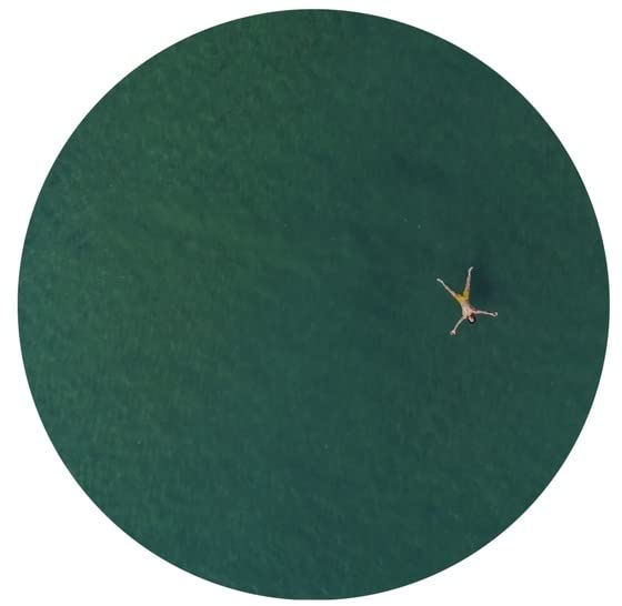 Dark green vinyl record with a small figure floating in water.