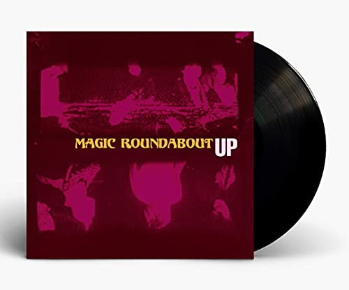 Magic Roundabout Up" vinyl record with a red and pink abstract cover.