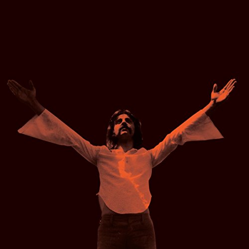 Red-toned album cover featuring a man with arms outstretched.