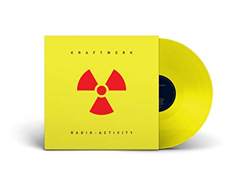 Yellow vinyl record sleeve with red radiation symbol and "Kraftwerk - Radio-Activity" text.