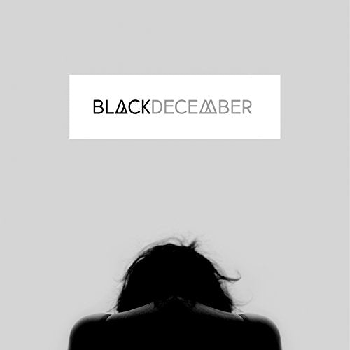 Black and white album cover with text and a silhouetted figure.
