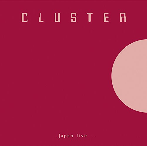 Red album cover with "Cluster" in white text and a white circle.