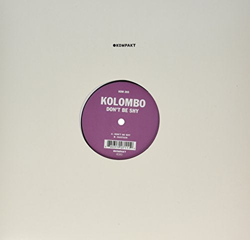 A vinyl record label with purple center and white text on a beige background.