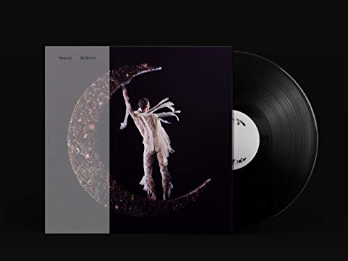 Smerz “Believer” vinyl record with figure reaching towards a dark sky.
