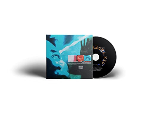 Vinyl record and CD for “Oklahoma Kid – Tangerine Tragic” album.