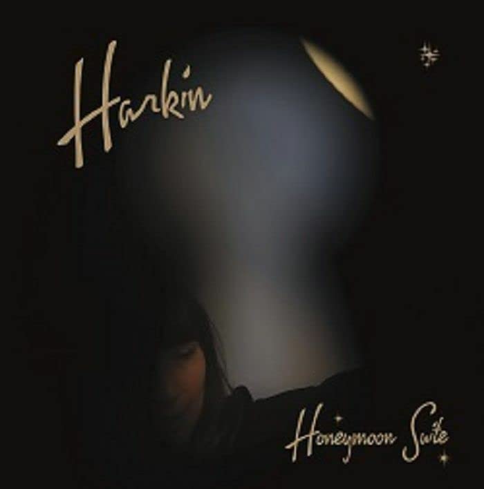 Dark album cover with handwritten text and a blurred figure.