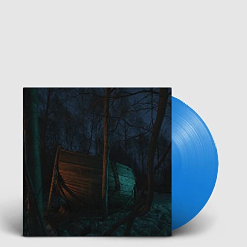 Vinyl record with blue edge, album art depicting a dark, snowy forest.