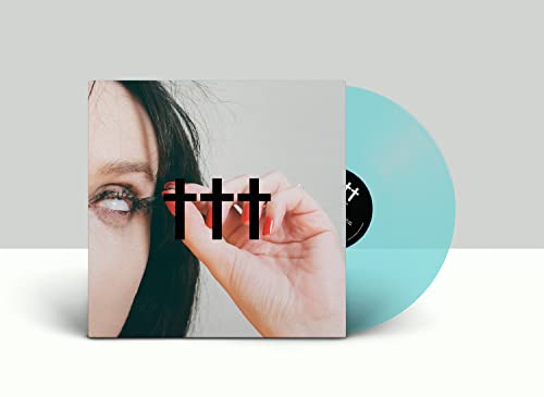 Vinyl record with cover featuring an eye, hand, and three crosses.