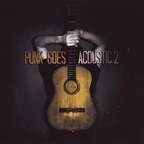 CD cover: acoustic guitar silhouetted against a dark background.