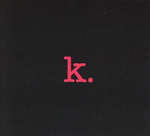 A black CD cover with a centered, red, lowercase 'k' and a period.