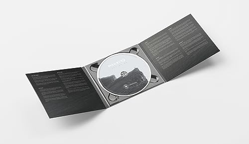 Open CD case with a silver disc featuring a snowy mountain landscape.