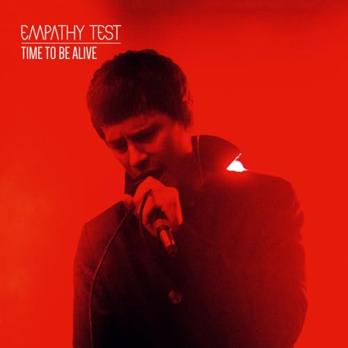 Red album cover featuring a man with a microphone, eyes closed.