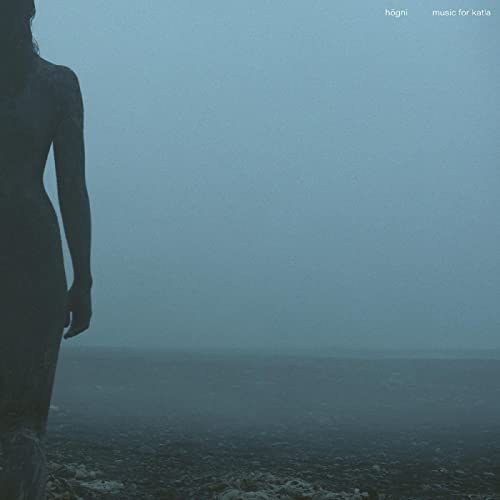 Dark, misty landscape with a silhouetted figure; album cover for Hogni’s Katla.