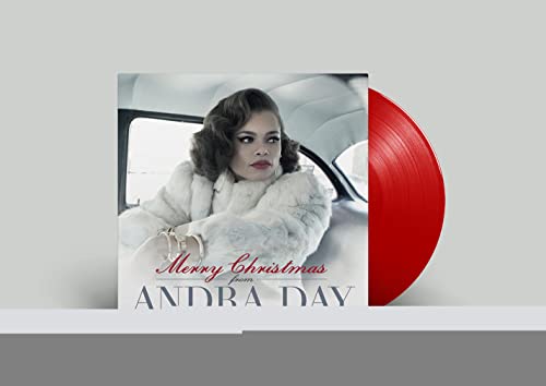 Andra Day album cover and a red vinyl record on gray background.