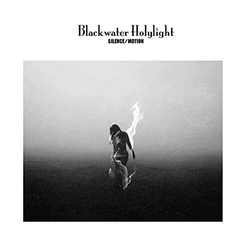 Black and white album cover depicting a figure with a flaming silhouette.