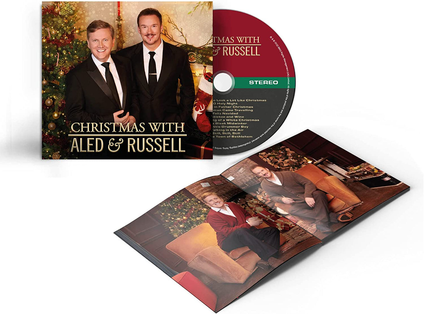 "CD case with disc and booklet, featuring two men in formal and casual attire."