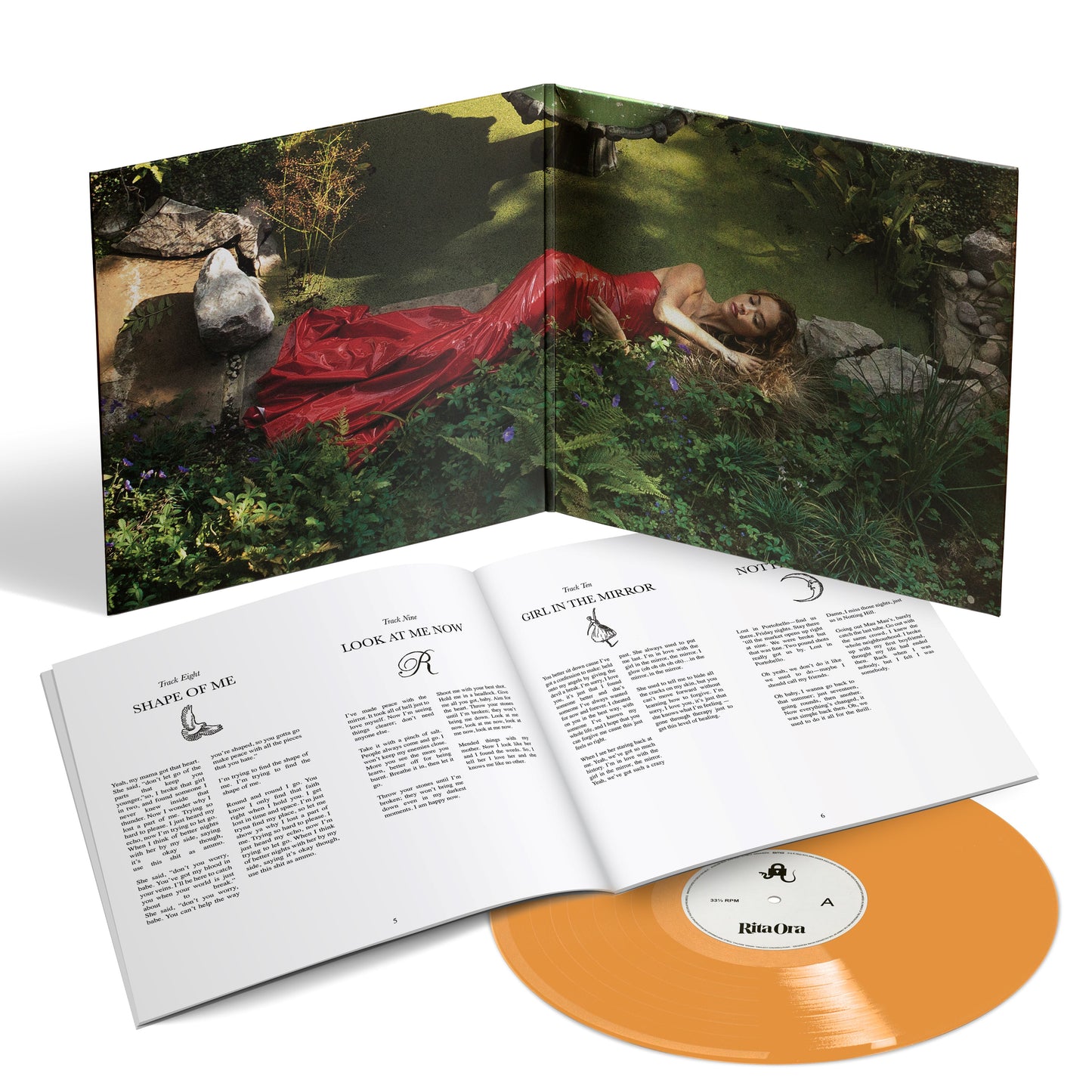 "Orange vinyl record with booklet and cover art featuring a woman in a red dress."