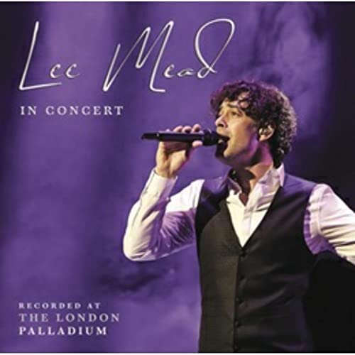Lee Mead singing into a microphone on album cover, purple background.