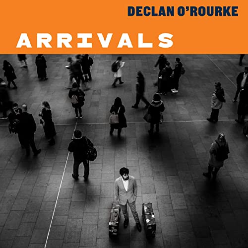 Declan O’Rourke’s “Arrivals” album cover: blurred crowd in a train station.